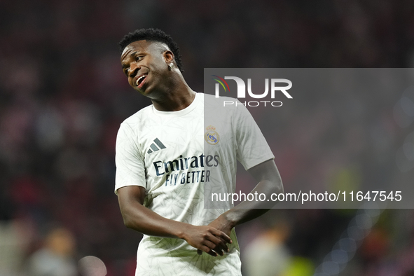 Vinicius Junior left winger of Real Madrid and Brazil during the warm-up before the LaLiga match between Atletico de Madrid and Real Madrid...