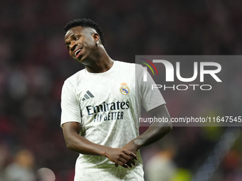 Vinicius Junior left winger of Real Madrid and Brazil during the warm-up before the LaLiga match between Atletico de Madrid and Real Madrid...