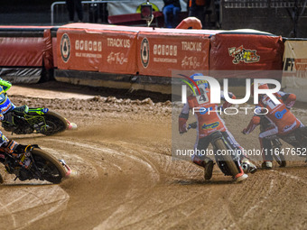 Belle Vue Colts' Luke Muff in blue pulls up as he is passed by Sheffield Cubs' Nathan Ablitt in white, Sheffield Cubs' Mickie Simpson in yel...