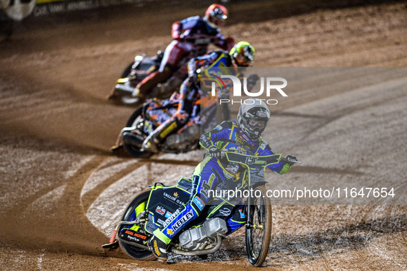 Nathan Ablitt of the Sheffield Cubs in White leads Mickie Simpson of the Sheffield Cubs in Yellow and Sam Hagon of the Belle Vue Colts in Re...