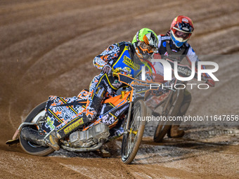 Sheffield Cubs' Mickie Simpson in Yellow leads Belle Vue Colts' Sam Hagon in Red during the WSRA National Development League match between B...