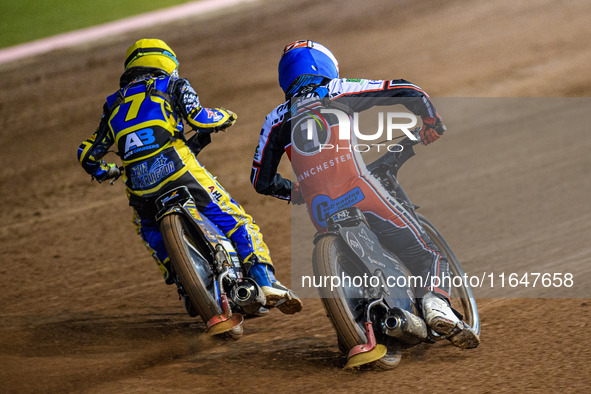 Jamie Etherington of the Sheffield Cubs in Yellow passes Harry McGurk of the Belle Vue Colts in Blue on the inside during the WSRA National...