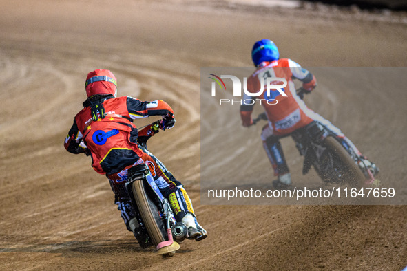 Belle Vue Colts' guest rider Jake Mulford in red chases Belle Vue Colts' Matt Marson in blue during the WSRA National Development League mat...