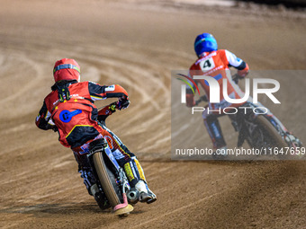 Belle Vue Colts' guest rider Jake Mulford in red chases Belle Vue Colts' Matt Marson in blue during the WSRA National Development League mat...