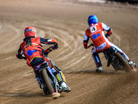 Belle Vue Colts' guest rider Jake Mulford in red chases Belle Vue Colts' Matt Marson in blue during the WSRA National Development League mat...