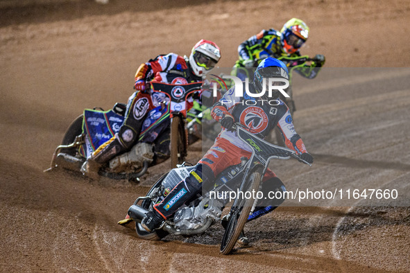 Belle Vue Colts' Matt Marson in blue leads Belle Vue Colts' guest rider Jake Mulford in red and Sheffield Cubs' Ace Pijper in yellow during...