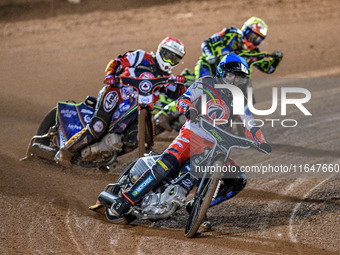 Belle Vue Colts' Matt Marson in blue leads Belle Vue Colts' guest rider Jake Mulford in red and Sheffield Cubs' Ace Pijper in yellow during...