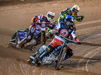 Belle Vue Colts' Matt Marson in blue leads Belle Vue Colts' guest rider Jake Mulford in red and Sheffield Cubs' Ace Pijper in yellow during...