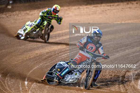 Matt Marson of Belle Vue Colts in blue leads Ace Pijper of Sheffield Cubs in yellow during the WSRA National Development League match betwee...