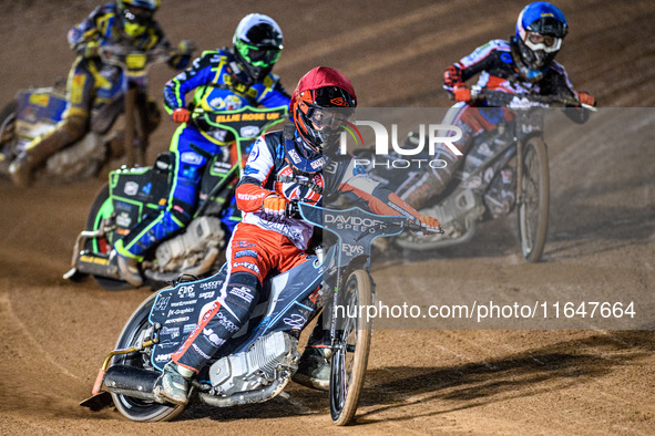 Freddy Hodder of Belle Vue Colts in Red leads Chad Wirtzfeld of Belle Vue Colts in Blue and Luke Harrison of Sheffield Cubs in White during...