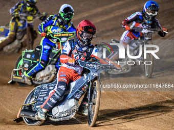 Freddy Hodder of Belle Vue Colts in Red leads Chad Wirtzfeld of Belle Vue Colts in Blue and Luke Harrison of Sheffield Cubs in White during...