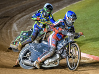 Harry McGurk of Belle Vue Colts in blue leads Luke Harrison of Sheffield Cubs in white during the WSRA National Development League match bet...