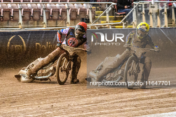 Belle Vue Colts' Matt Marson in red rides outside Sheffield Cubs' Jamie Etherington in yellow during the WSRA National Development League ma...