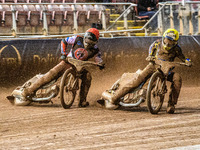 Belle Vue Colts' Matt Marson in red rides outside Sheffield Cubs' Jamie Etherington in yellow during the WSRA National Development League ma...