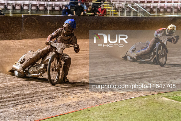 Freddy Hodder of Belle Vue Colts in blue leads Stene Pijper of Sheffield Cubs in white during the WSRA National Development League match bet...