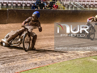 Freddy Hodder of Belle Vue Colts in blue leads Stene Pijper of Sheffield Cubs in white during the WSRA National Development League match bet...