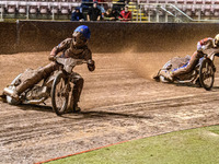 Freddy Hodder of Belle Vue Colts in blue leads Stene Pijper of Sheffield Cubs in white during the WSRA National Development League match bet...