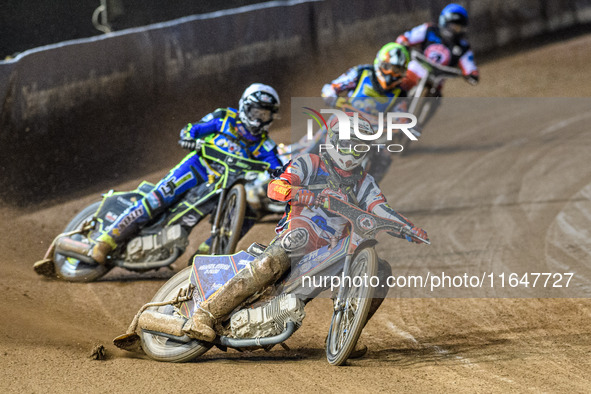 Belle Vue Colts' guest rider Jake Mulford in red leads Sheffield Cubs' Nathan Ablitt in white, Sheffield Cubs' Mickie Simpson in yellow, and...