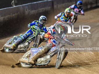 Belle Vue Colts' guest rider Jake Mulford in red leads Sheffield Cubs' Nathan Ablitt in white, Sheffield Cubs' Mickie Simpson in yellow, and...