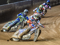 Belle Vue Colts' guest rider Jake Mulford in red leads Sheffield Cubs' Nathan Ablitt in white, Sheffield Cubs' Mickie Simpson in yellow, and...