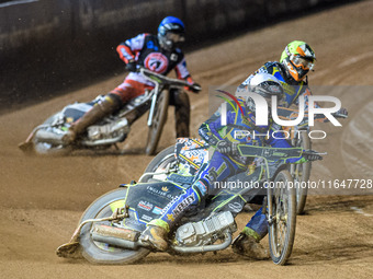 Nathan Ablitt of the Sheffield Cubs in White leads Mickie Simpson of the Sheffield Cubs in Yellow and Matt Marson of the Belle Vue Colts in...