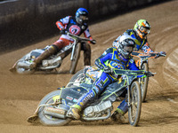 Nathan Ablitt of the Sheffield Cubs in White leads Mickie Simpson of the Sheffield Cubs in Yellow and Matt Marson of the Belle Vue Colts in...