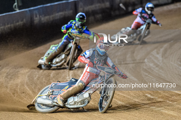 Sam Hagon of Belle Vue Colts in Red leads Luke Harrison of Sheffield Cubs in White and Chad Wirtzfeld of Belle Vue Colts in Blue during the...