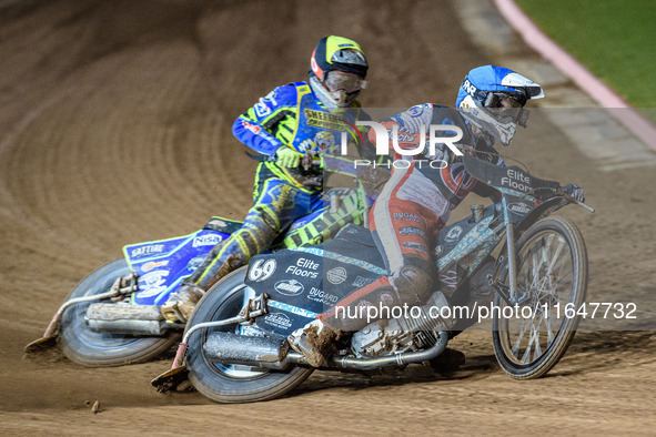 Belle Vue Colts' Chad Wirtzfeld in blue passes Sheffield Cubs' Kean Dicken in yellow during the WSRA National Development League match betwe...