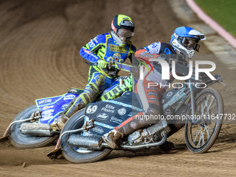 Belle Vue Colts' Chad Wirtzfeld in blue passes Sheffield Cubs' Kean Dicken in yellow during the WSRA National Development League match betwe...