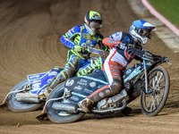 Belle Vue Colts' Chad Wirtzfeld in blue passes Sheffield Cubs' Kean Dicken in yellow during the WSRA National Development League match betwe...