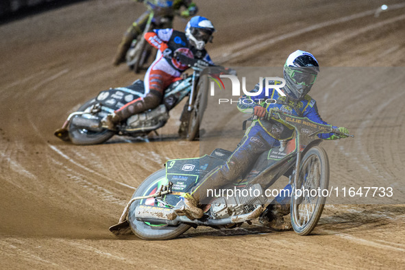 Luke Harrison of the Sheffield Cubs in white leads Chad Wirtzfeld of the Belle Vue Colts in blue during the WSRA National Development League...