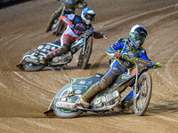 Luke Harrison of the Sheffield Cubs in white leads Chad Wirtzfeld of the Belle Vue Colts in blue during the WSRA National Development League...