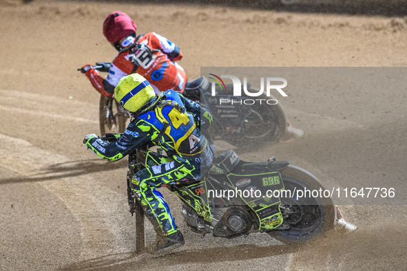 Sheffield Cubs' Ace Pijper in Yellow chases Belle Vue Colts' Freddy Hodder in Red during the WSRA National Development League match between...