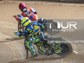 Sheffield Cubs' Ace Pijper in Yellow chases Belle Vue Colts' Freddy Hodder in Red during the WSRA National Development League match between...