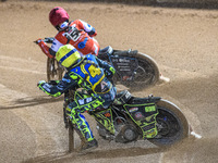 Sheffield Cubs' Ace Pijper in Yellow chases Belle Vue Colts' Freddy Hodder in Red during the WSRA National Development League match between...