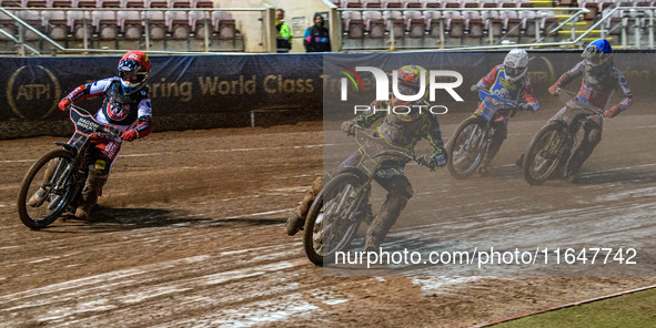 Sheffield Cubs' Ace Pijper in Yellow rides inside Belle Vue Colts' Sam Hagon in Red, with Belle Vue Colts' Harry McGurk in Blue and Sheffiel...