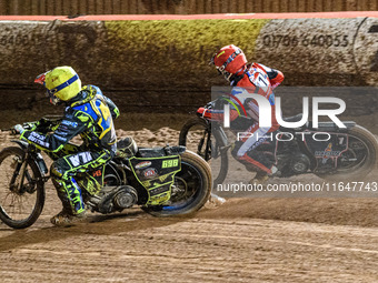 Sheffield Cubs' Ace Pijper rides inside Belle Vue Colts' Sam Hagon in red during the WSRA National Development League match between Belle Vu...