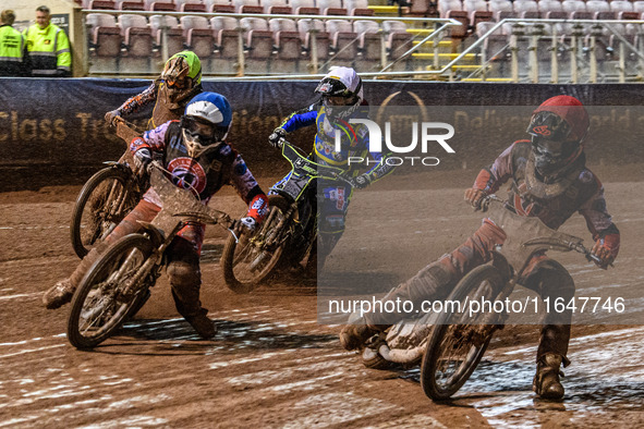 Belle Vue Colts' Freddy Hodder in Red and Belle Vue Colts' Chad Wirtzfeld in Blue lead Sheffield Cubs' Nathan Ablitt in White and Sheffield...