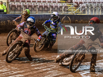 Belle Vue Colts' Freddy Hodder in Red and Belle Vue Colts' Chad Wirtzfeld in Blue lead Sheffield Cubs' Nathan Ablitt in White and Sheffield...