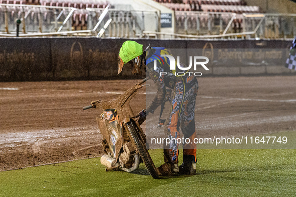 Mickie Simpson of the Sheffield Cubs checks his bike after his mechanical retirement during the WSRA National Development League match betwe...