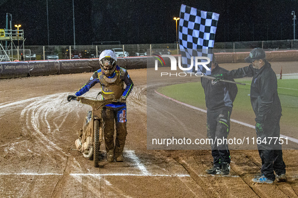 Sheffield Cubs' Nathan Ablitt crosses the finish line after pushing his bike for half a lap of the 380-meter track during the WSRA National...