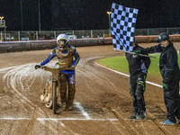 Sheffield Cubs' Nathan Ablitt crosses the finish line after pushing his bike for half a lap of the 380-meter track during the WSRA National...