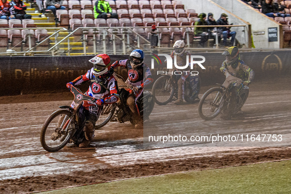 Belle Vue Colts' guest rider Jake Mulford in red leads Belle Vue Colts' Chad Wirtzfeld in blue, Sheffield Cubs' Kean Dicken in yellow, and S...