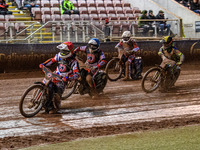 Belle Vue Colts' guest rider Jake Mulford in red leads Belle Vue Colts' Chad Wirtzfeld in blue, Sheffield Cubs' Kean Dicken in yellow, and S...