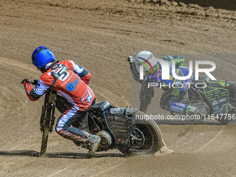 Belle Vue Colts' Freddy Hodder in blue rides inside Sheffield Cubs' Nathan Ablitt in white during the WSRA National Development League match...