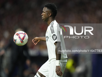 Vinicius Junior left winger of Real Madrid and Brazil controls the ball during the LaLiga match between Atletico de Madrid and Real Madrid C...