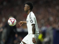 Vinicius Junior left winger of Real Madrid and Brazil controls the ball during the LaLiga match between Atletico de Madrid and Real Madrid C...