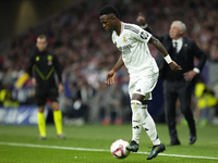 Vinicius Junior left winger of Real Madrid and Brazil controls the ball during the LaLiga match between Atletico de Madrid and Real Madrid C...