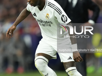 Vinicius Junior left winger of Real Madrid and Brazil controls the ball during the LaLiga match between Atletico de Madrid and Real Madrid C...