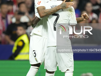 Eder Militao centre-back of Real Madrid and Brazil celebrates after scoring his sides first goal during the LaLiga match between Atletico de...